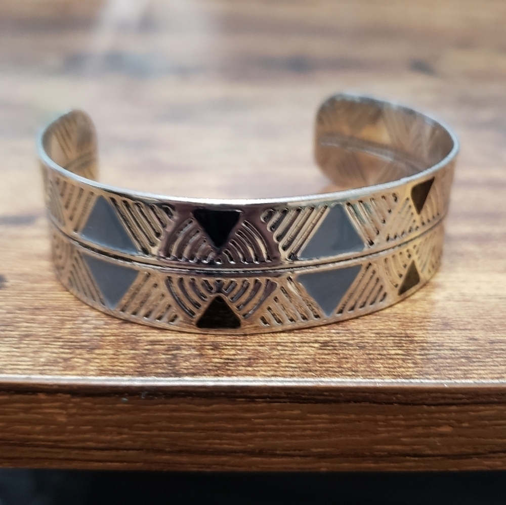 boho silver tone metal cuff bracelet with blue and black triangles